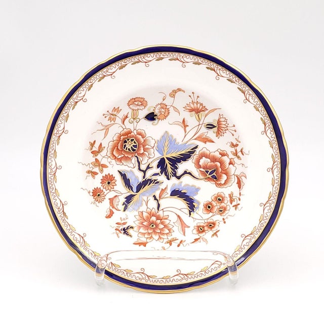 A set of nine Royal Crown Derby soup bowls, circa 1980. Retailed by Tiffany & Co.