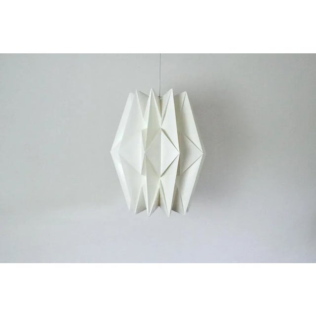 Large le klint 152, hand-pleated in plastic. The model was designed in 1962 by the danish arcitects peter hvidt & orla...