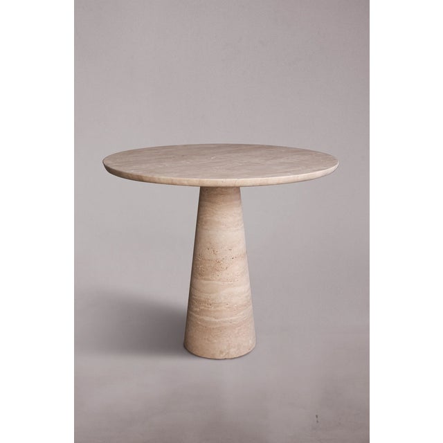 Elevate your dining space with our Conical Leg Travertine Dining Table. Crafted from premium travertine stone, each table...