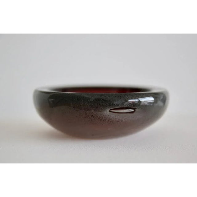 Beautiful tones and bubble work on all the contour of the piece. This piece has an attribution mark, I am sure that it is...