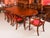 This is an elegant antique regency revival flame mahogany wind-out telescoping movement dining table by selbat, which can...
