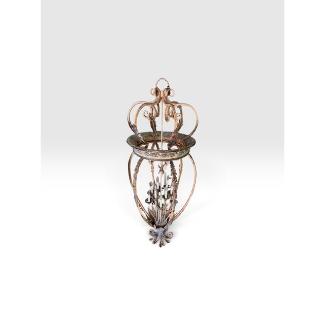 Create an unforgettable first impression with this monumental six-foot hand-forged wrought iron foyer chandelier. Designed...
