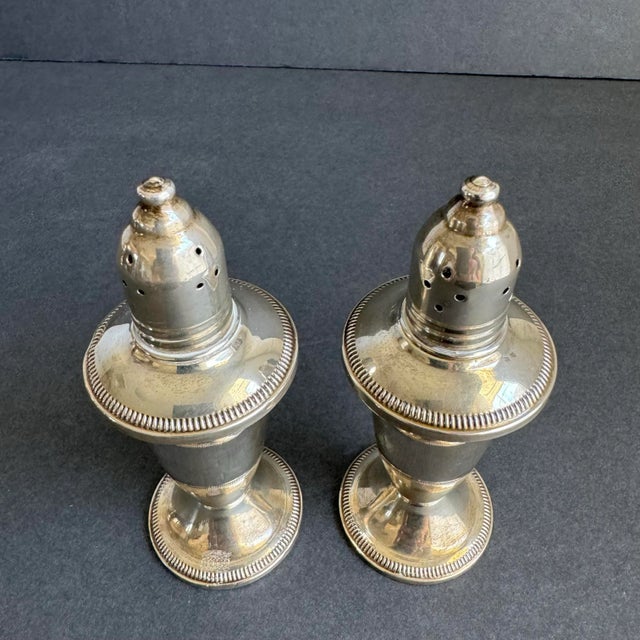 Sterling Silver Salt & Pepper Shakers Raimond Vintage A timeless set of sterling silver salt & pepper shakers by Raimond....