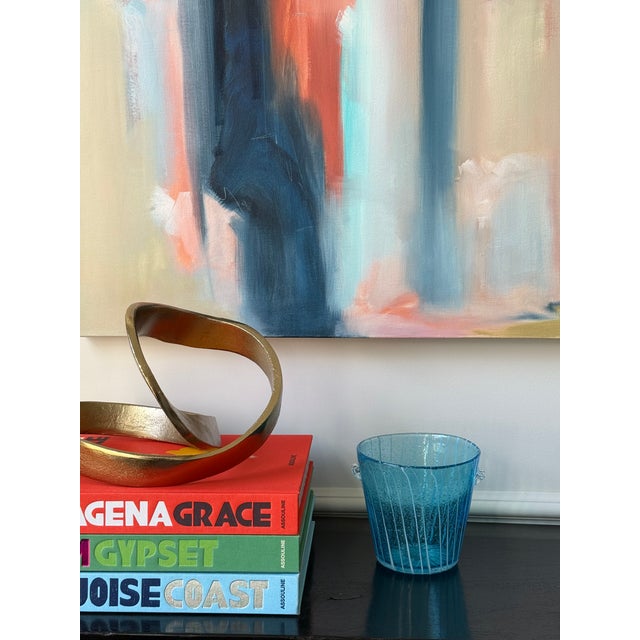 This petite vintage Murano glass ice bucket is perfect for entertaining. The blue color with white accent stripes and tiny...