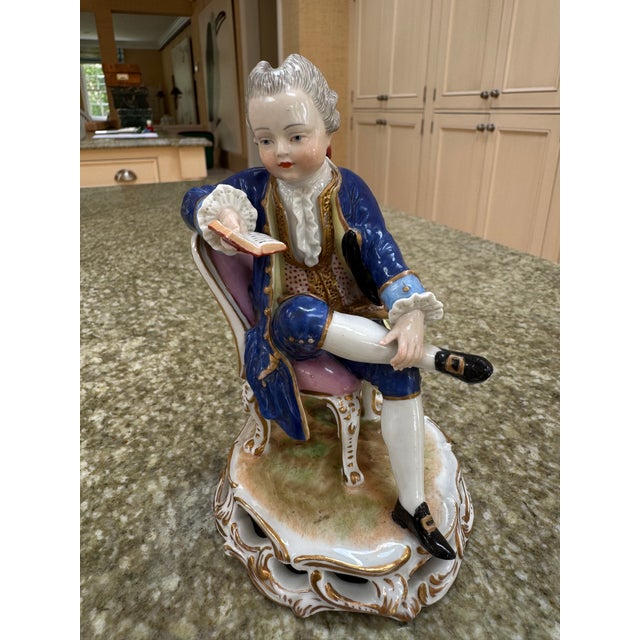 Delightful pair of porcelain figures likely from the Nymphenburg factory in Munich Bavaria