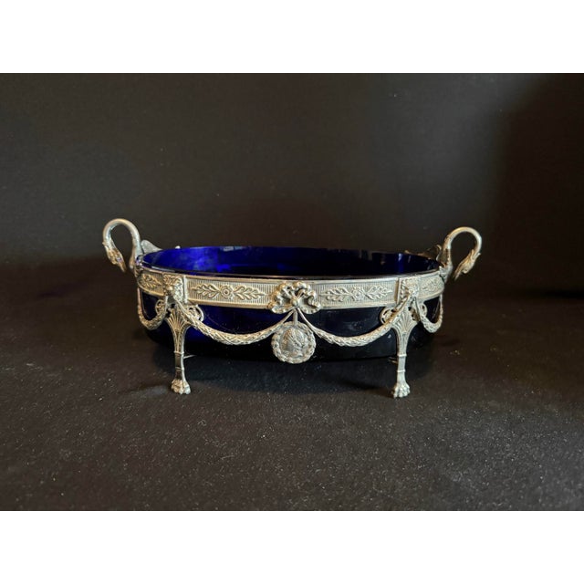 With Original Cobalt Blue Glass Insert Category: Decorative Bowls & Jardinières Number of Pieces: 1 This refined 19th-...