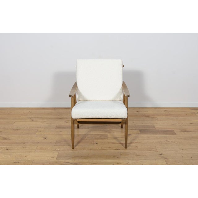 The armchair was produced by the Czechoslovak company TON in the 1960s. The beech elements have been cleaned from the old...