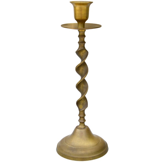 Gorgeous midcentury candleholder constructed of solid heavy brass, exhibiting elegant ruffled pattern and elaborate...