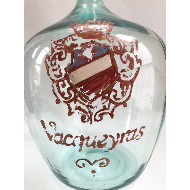 Monumental French vineyard demi john in a desirable light green color to bottle with hand-decorated family vineyard crest...