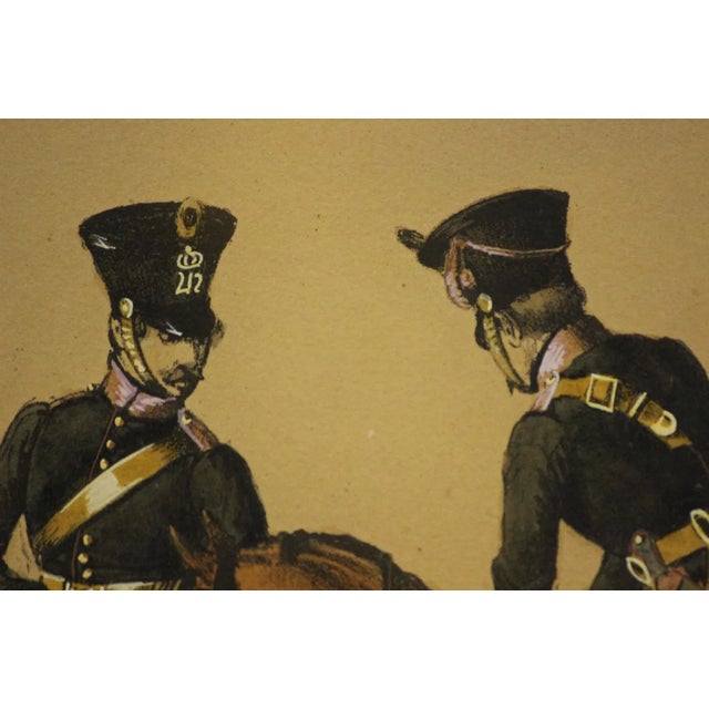 Stylish equestrian cavalry colour plate w/ hand- gouache highlights depicting two gendarmerie officers en grande tenue!...