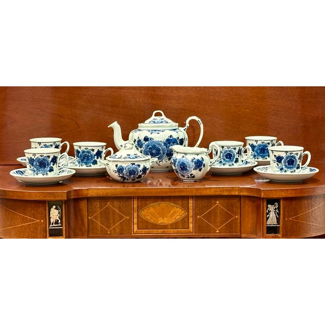 Charming Dutch blue and white Delft tea service by De Koninklijke Goedewaagen of Holland, marked “Blauw Delft Handwerk.”...