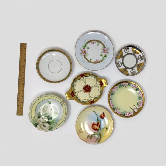 Gorgeous, curated collection of 7 antique hand-painted porcelain pieces from the legendary Pickard Decorator Studio....