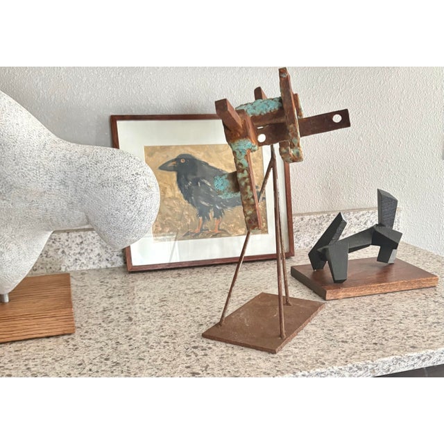 This is a mid-20th century abstract expressionist sculpture constructed from welded iron and steel, featuring a prominent...