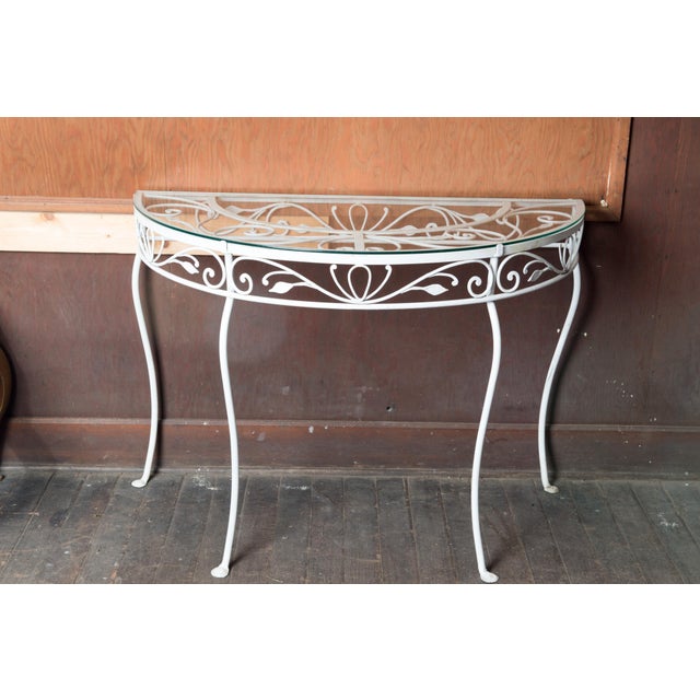 1940s fine quality wrought iron Salterini demi lune console table with glass top. Salterini was consider the best quality...