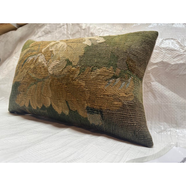 This decorative pillow is crafted from an authentic 17th century Brussels tapestry fragment originating from the...