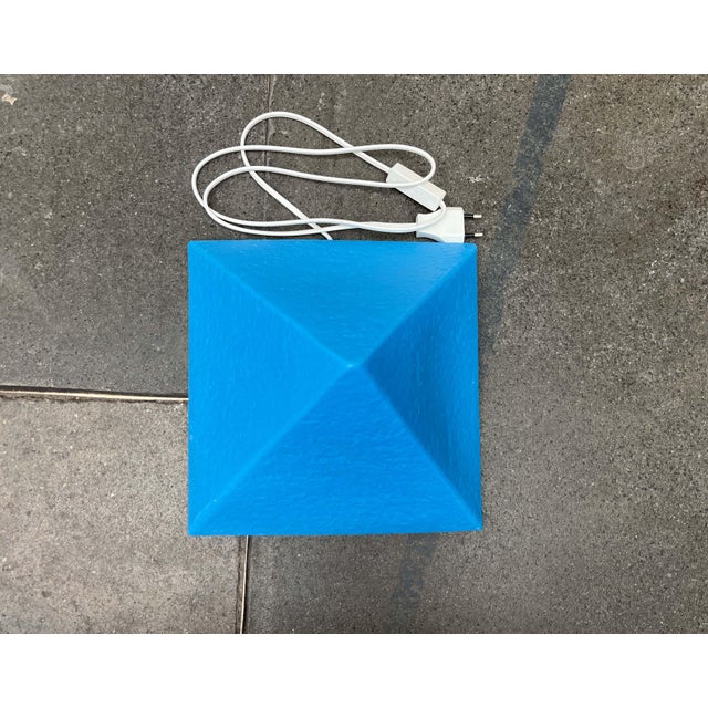 Postmodern pyramid-shaped floor/table lamp by Heico. These lamps feature the graphic form of a pyramid. The color scheme...