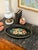 Featuring a floral motif and beautifully worn, chippy paint, this piece has the kind of authentic patina that only comes...