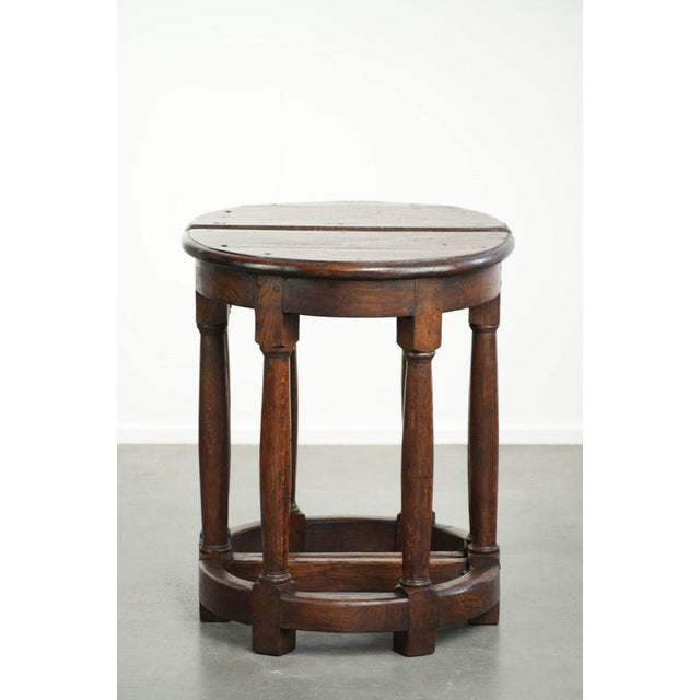 This unique set of 2 antique English side tables dates from the late 19th century and has a wonderful country appearance....