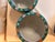 Pair of large Japanese porcelain planters with intricate designs. Detailed decoration.