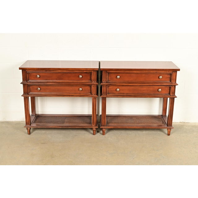 A gorgeous pair of French Regency Louis XVI style console tables, sofa tables, or buffet servers By Drexel Heritage USA,...