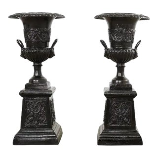 Pair of Cast Iron Campana Form Garden Urns on Stands For Sale