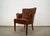 Vintage 1960's Mid Century Modern club armchair for sale. It has the original naugahyde faux leather, and is in excellent...