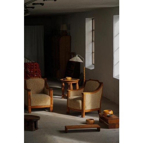 A refined pair of Danish Art Deco armchairs/lounge chairs, dating from the early to mid-20th century, embodying the...