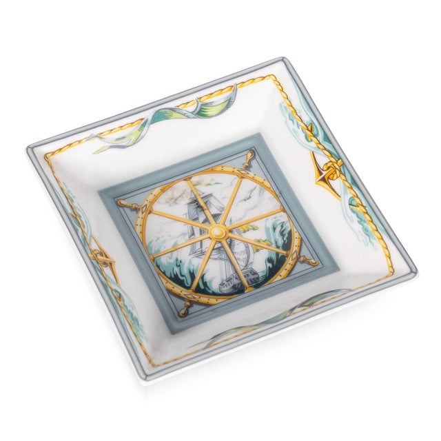 An elegant Hermès porcelain vide-poche, produced in France during the late twentieth century and exemplifying the timeless...