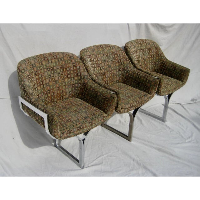 This three seater sofa or waiting room seat as very pure and elegant lines typically mid century, heavy frame in copper...