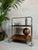Handy vintage serving trolley made of metal (chrome) and plywood. It has a slightly industrial look. Marked: Gerlinol....