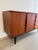 Exceptional mid-century teak sideboard with black details from the Swedish company Bräntorps, 1950s-60s. This piece has an...