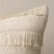 This pillow features Acadia with a knife edge finish. A horizontal fringed stripe, this pattern derives from a textile in...
