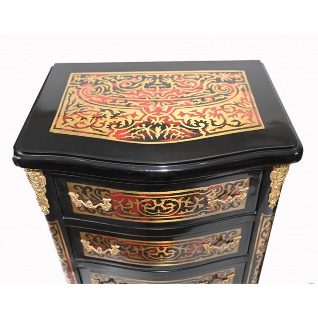 Gorgeous single French Boulle style chest of drawers. Boulle was a famous French cabinet maker working out of Paris in the...