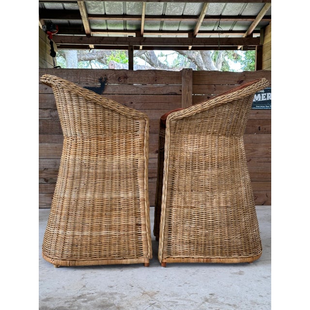 Fabulous pair of vintage large braid rattan bar stools that have been previously upholstered. Stools are part of an estate...