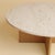 The Hirado is a Roman travertine and oak coffee table, a low table for the space in front of a sofa in which a travertine...