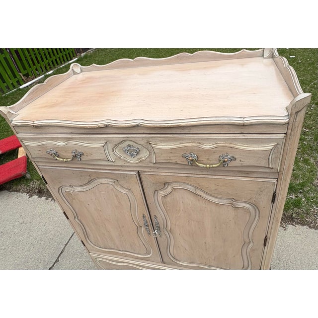 This is a mid-century vintage French country inspired Chest of drawers. This chest features one drawer at the top and one...