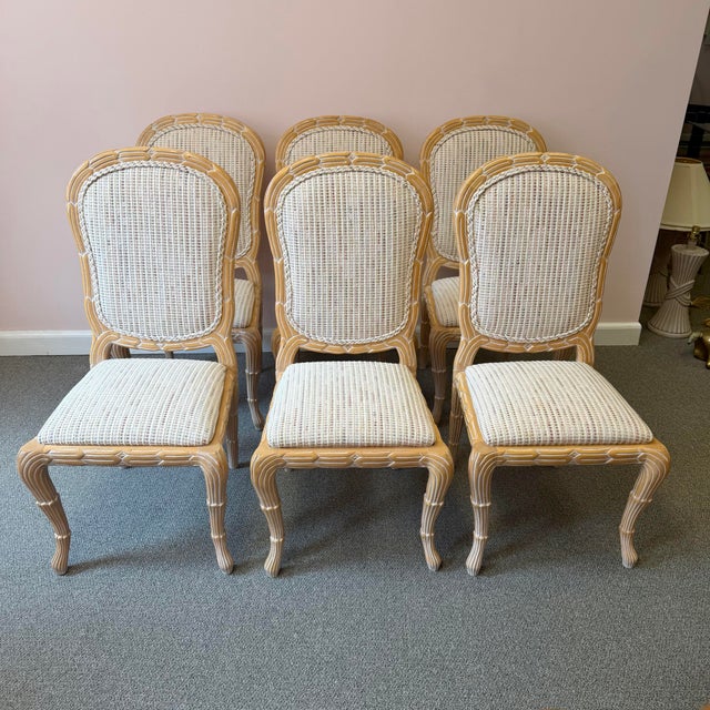 A beautiful set of 6 Serge Roche style dining chairs, with a Palm Beach Regency style faux bois design and neutral colored...