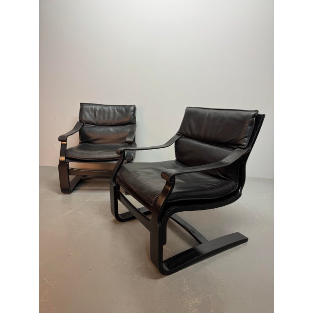 Set of two iconic Kroken lounge chairs designed by Åke Fribytter for Nelo Möbel in the 1970s. Featuring bentwood frames...