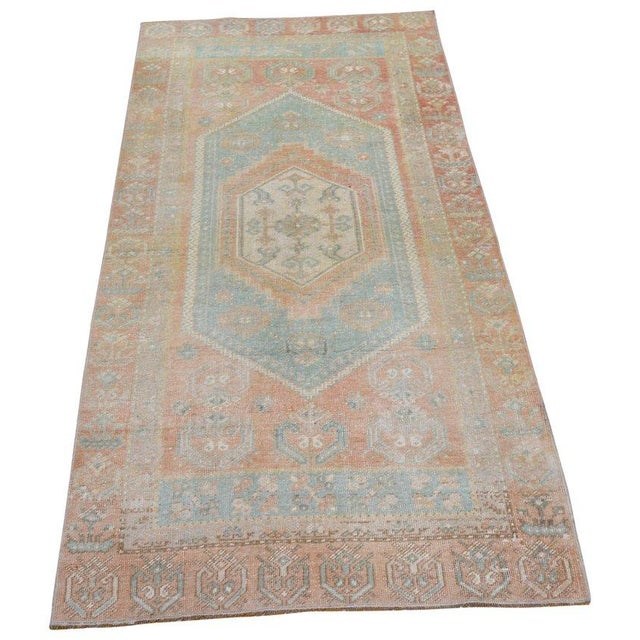 Hand-knotted with care using traditional rug-making techniques, this wool rug blends timeless craftsmanship with a modern...