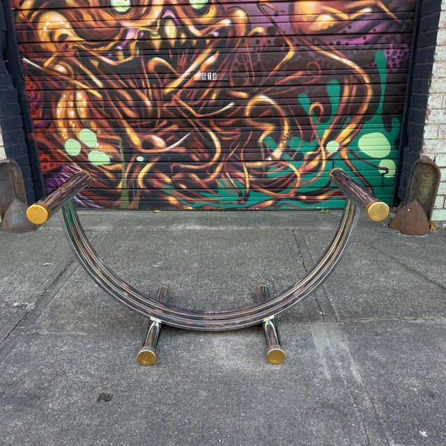 This is a Romeo Rega chrome and brass U-shaped table base. There is no glass top available.