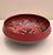 A striking vintage Norwegian wooden bowl, hand-painted in the traditional Rosemaling folk art style. The bowl features a...