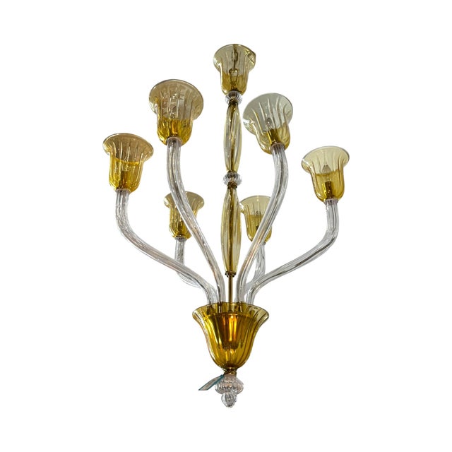 Bring old-world romance and Italian elegance into your space with this stunning Venetian glass chandelier. Featuring...