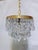 Bring the timeless opulence of a European salon into your home with this exquisite vintage crystal upside down chandelier....