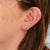 Sunlit yellow sapphires rest within a sparkling halo of diamonds in these emerald-cut stud earrings, crafted in solid 14K...