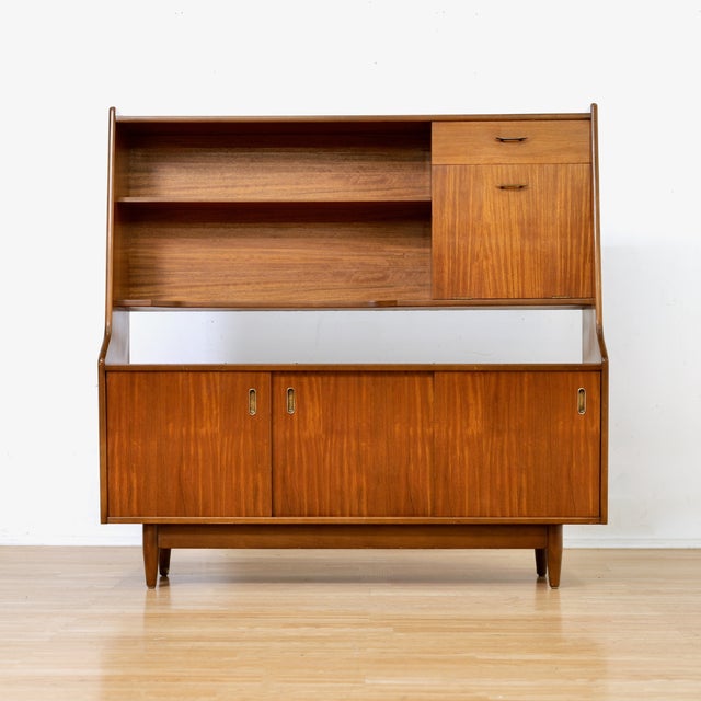 This mid-century hutch credenza was produced by White &amp; Newton of Portsmouth (UK) during the 1960s. A fantastic buffet...