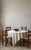 A set of four French Modernist dining chairs, attributed to Charles Dudouyt and dating to the 1940s–1950s. Made from solid...