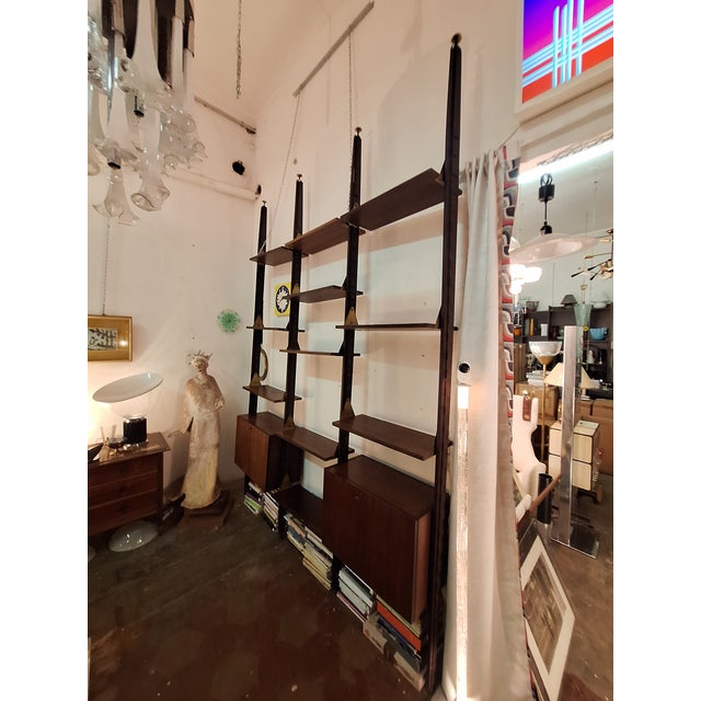 Wooden Floor-to-Ceiling Bookcase with Brass Ends, 1950s, in Very Good conditions. Designed 1950 to 1959
