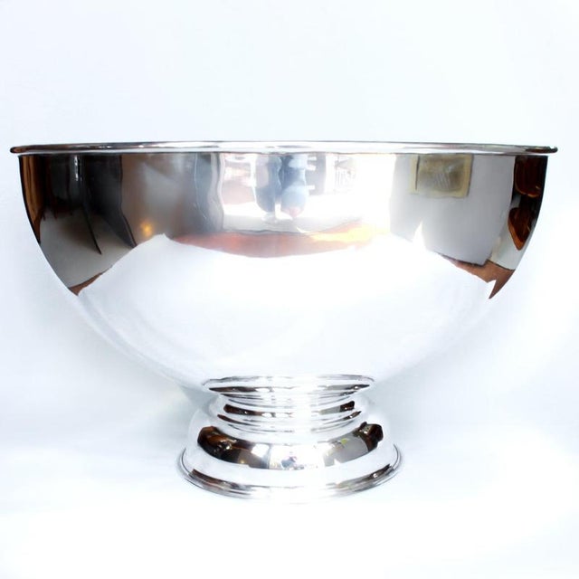 A large, silver plated champagne bowl of recent manufacture with raised detail to side. Dimensions: H 43cm, Diameter 69cm...
