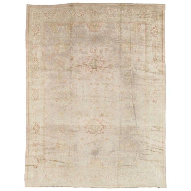 Antique Oushak carpet. Measures: 10'2" x 13'3" West Anatolia is one of the largest weaving regions in Turkey. Since the...