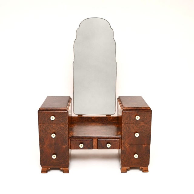 An absolutely stunning French Art Deco burr walnut dressing table. This was made in France, it dates from the 1930’s. It...